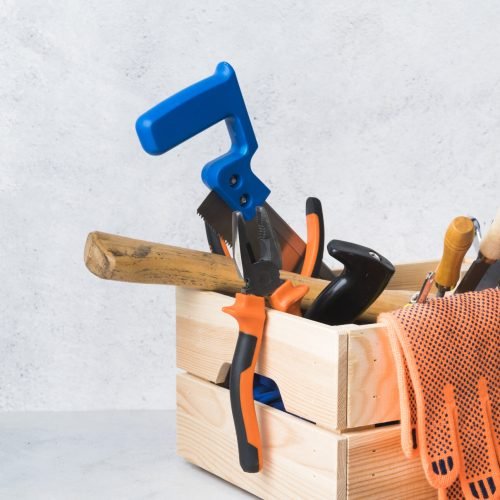 close-up-wooden-toolbox-with-different-tools close-up-wooden-toolbox-with-different-tools
